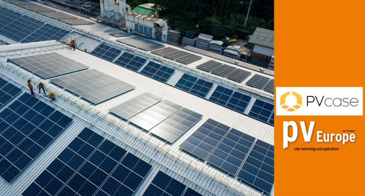 Workers installing solar panels on a large rooftop, alongside a PV Europe conference advertisement. - © PV Case