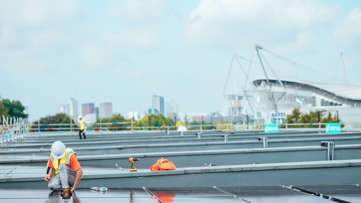 © Lexy Ilsley/Manchester City FC Solar Panels are placed on the roof of the Joie Stadium in Manchester, England.